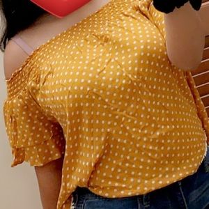 Off the shoulder yellow polka dot shirt